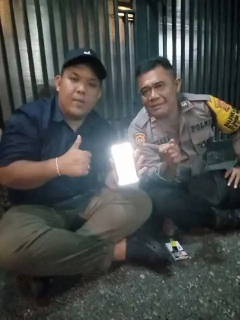 Bhabinkamtibmas Sosialisasikan Aplikasi Polisi Banjar Hebat kepada masayarakat