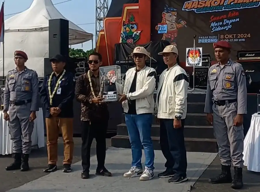 KPU Sidoarjo Sambut Kirab Maskot SIJALIH dari Kabupaten Pasuruan.